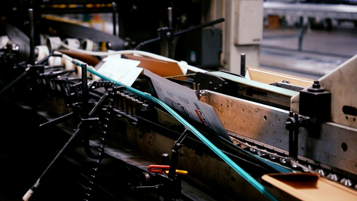Shows box on assembly line at Jamestown container